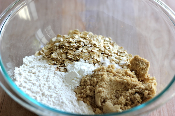 Peach Oatmeal Muffins - Wonderfully light and healthy, these cinnamon sugar crusted muffins are the perfect start to your mornings!