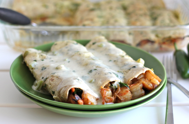 Roasted Shrimp Enchiladas with Jalapeño Cream Sauce - Smothered in a rich, jalapeño cream sauce, how can you resist?!
