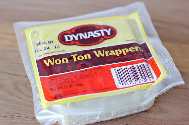 Buffalo Chicken Cups - Crisp oven-baked wonton cups loaded with buffalo chicken and blue cheese!