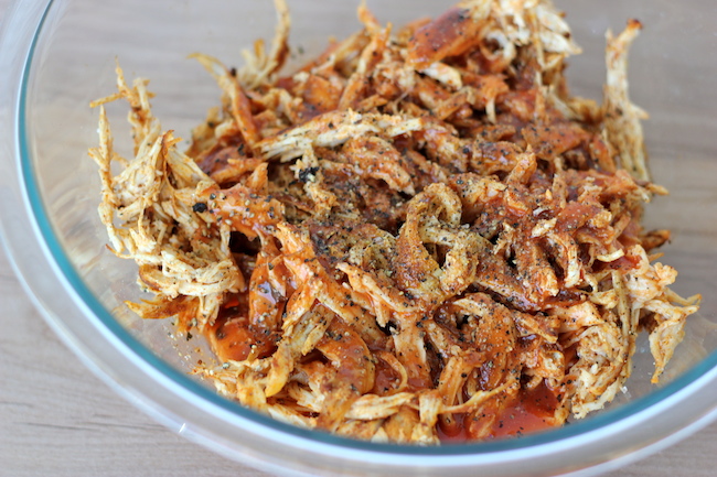 Buffalo Chicken Cups - Crisp oven-baked wonton cups loaded with buffalo chicken and blue cheese!