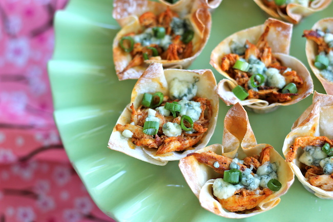 Buffalo Chicken Cups - Crisp oven-baked wonton cups loaded with buffalo chicken and blue cheese!
