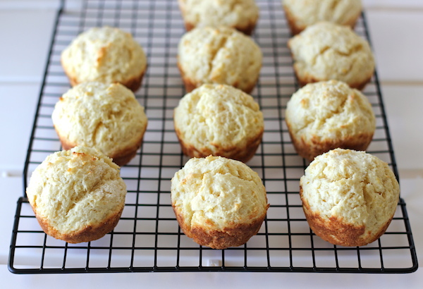 Orange Sour Cream Muffins with Zesty Orange Glaze - Start your mornings off right with these refreshing muffins with a decadent glaze!