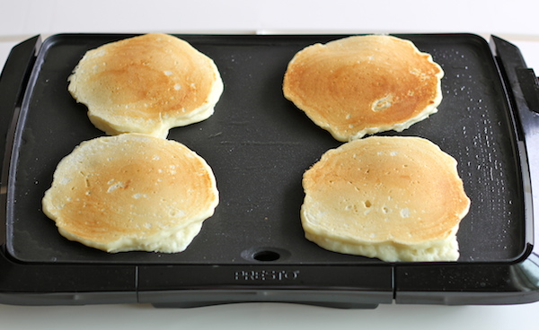 Buttermilk Pancakes with Strawberry Sauce - Start your mornings off right with these fluffy, melt-in-your-mouth pancakes!