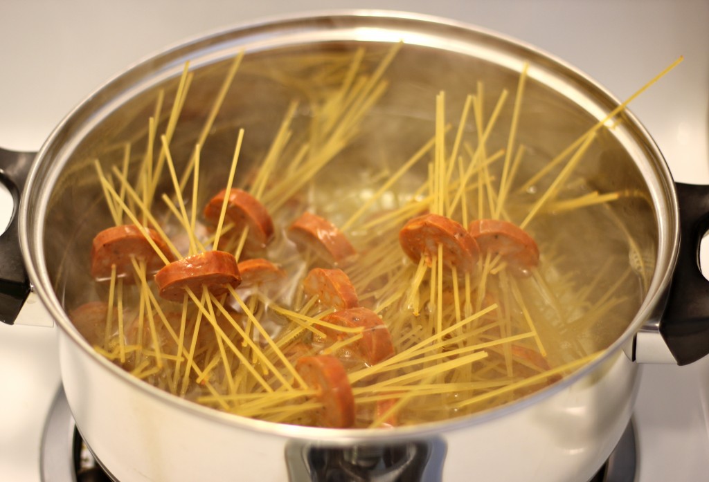 Threaded Spaghetti Hot Dog Bites with Homemade Marinara Sauce - These hot dog bites are so fun to make with both kids and grown-ups!