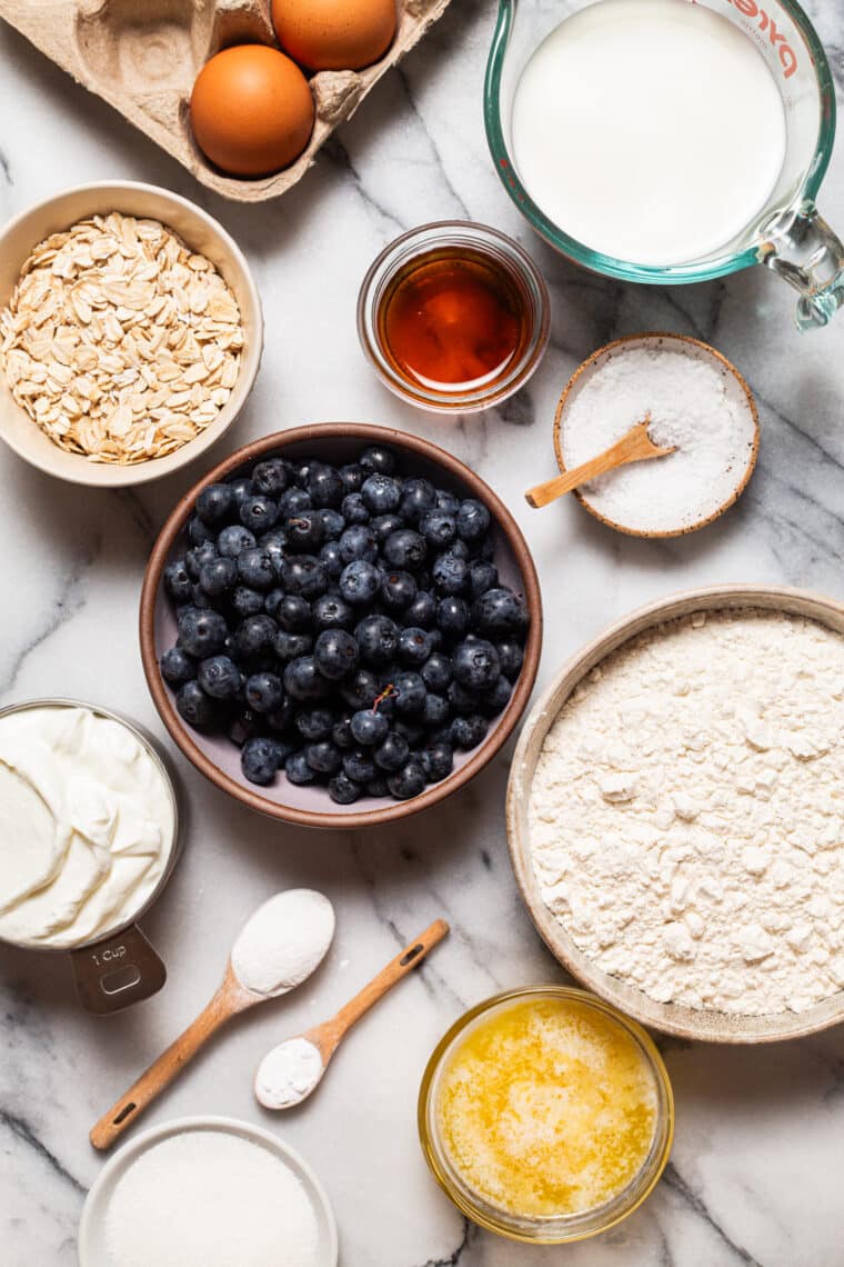 Blueberry Oatmeal Yogurt Pancakes - Start your mornings off right with these light, fluffy protein-packed pancakes, loaded with juicy blueberries. And they are freezer-friendly!