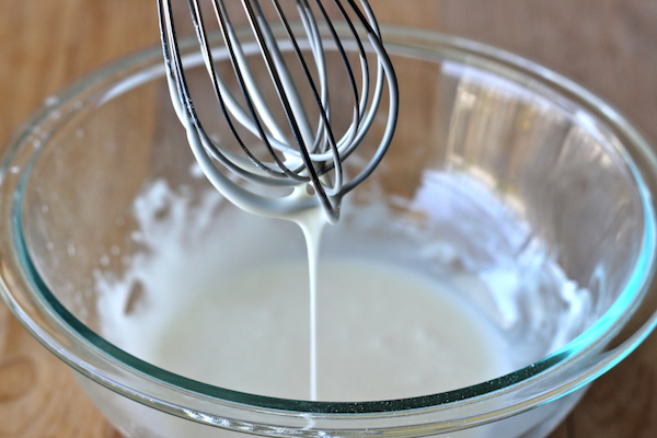 Monkey Bread Cupcakes - Classic monkey bread in irresistible cupcake form oozing with cinnamon sugar goodness and a dripping vanilla glaze!