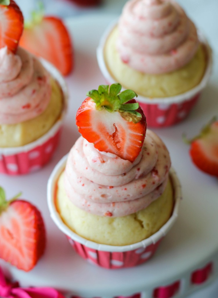 Strawberry Shortcake Cupcakes - Conveniently in cupcake form with a strawberry buttercream that is to die for!