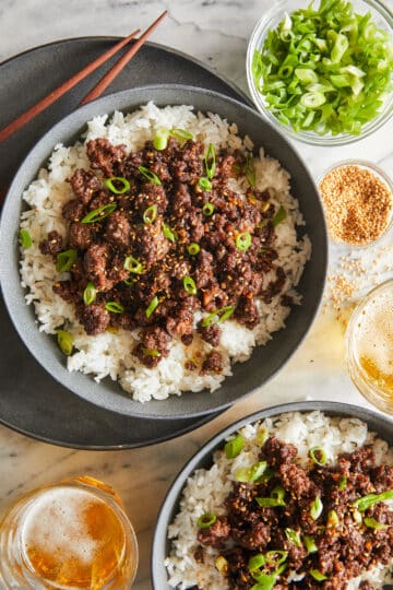 Korean beef bowl served with white rice and sesame seeds