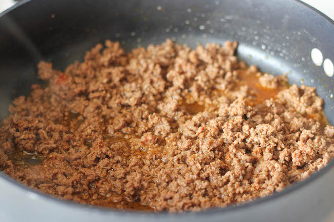 Beef Queso Dip - An incredibly velvety, meaty queso dip that is completely irresistible, and you can make it in just 15 minutes!