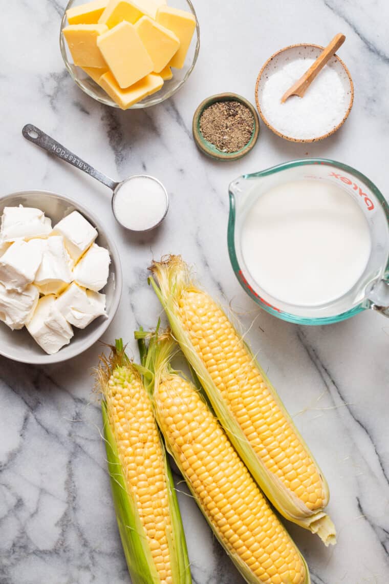 Slow Cooker Creamed Corn - The dreamiest creamed corn! So velvety and creamy, and unbelievably easy to make with just 5 ingredients. Simply set and forget. SO GOOD!
