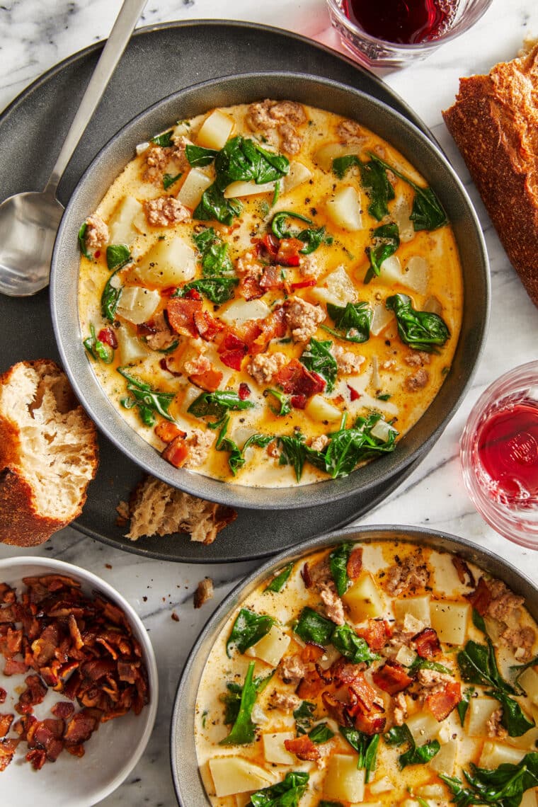 Olive Garden Zuppa Toscana Copycat Recipe - So easy to make and 10x better than the original! With Italian sausage, potatoes, spinach + bacon!