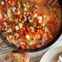 Leftover hambone soup recipe with diced ham, carrots, and beans in broth