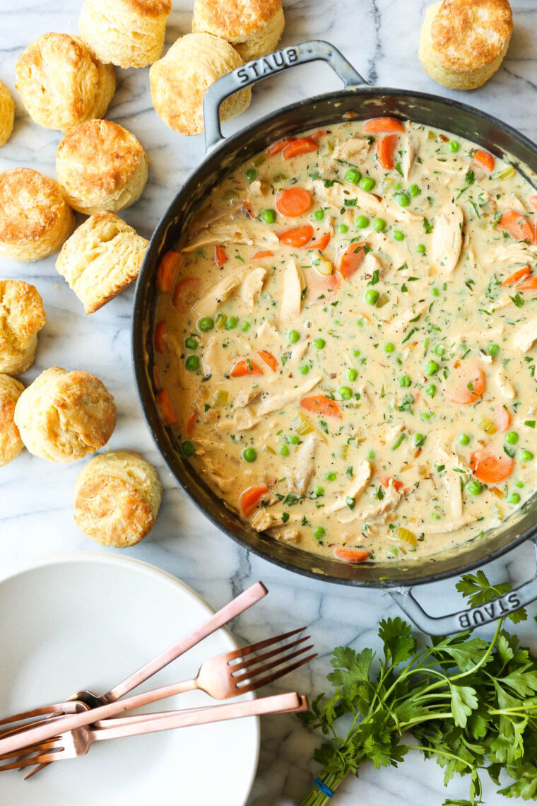 Biscuit Pot Pie - The ultimate comfort food! Topped with the flakiest, mile-high biscuits ever (made ahead of time). So cozy + so darn good!