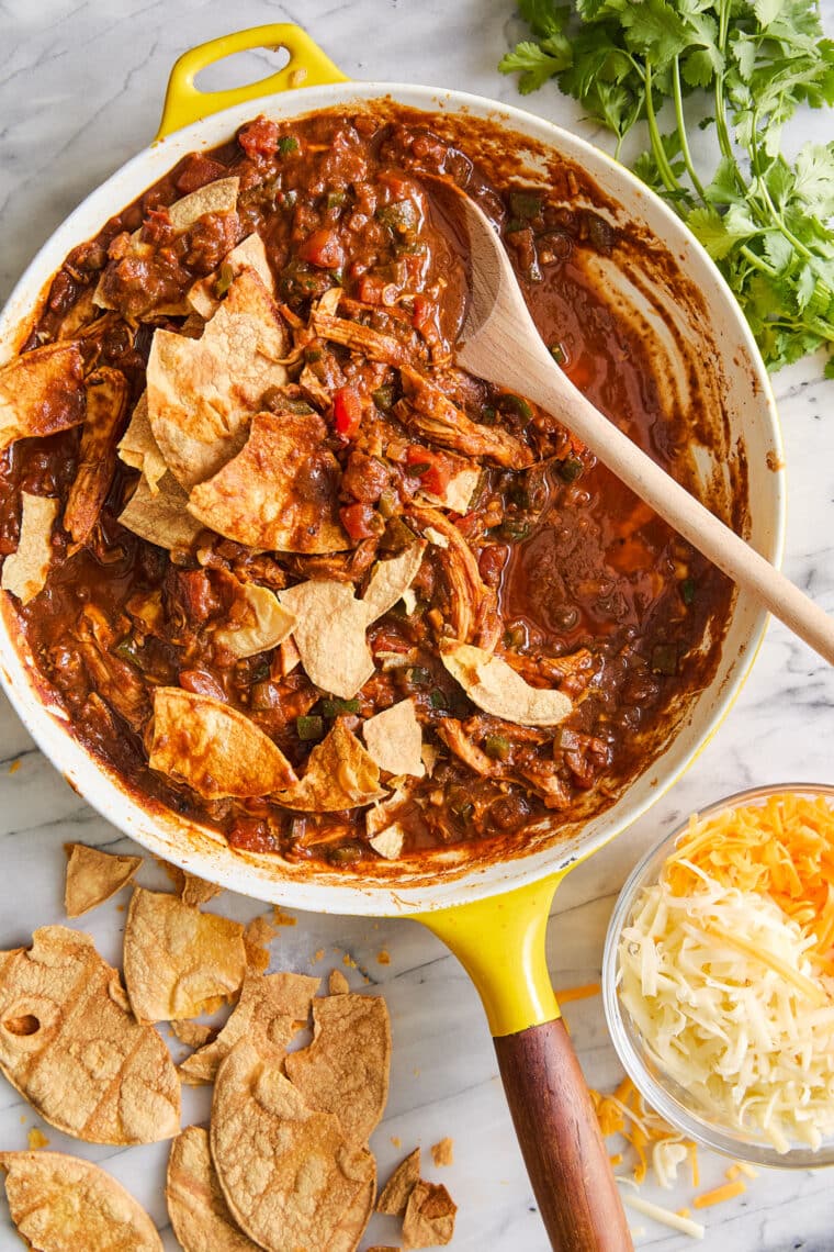 Chicken Enchilada Skillet - A quick, easy one pot dinner to feed a crowd! No rolling, no folding! Serve with your favorite toppings. SO GOOD!