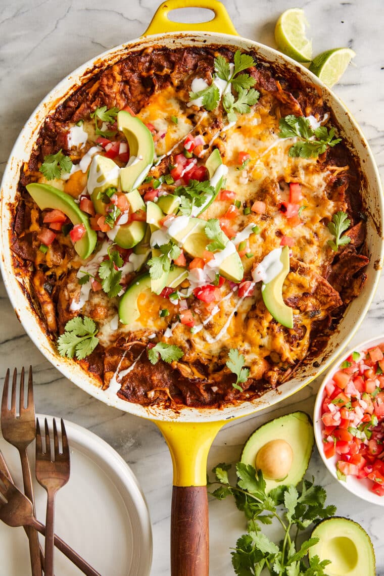 Chicken Enchilada Skillet - A quick, easy one pot dinner to feed a crowd! No rolling, no folding! Serve with your favorite toppings. SO GOOD!