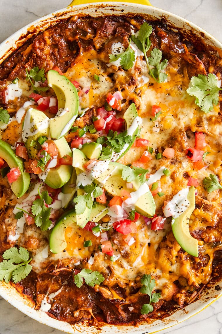 Chicken Enchilada Skillet - A quick, easy one pot dinner to feed a crowd! No rolling, no folding! Serve with your favorite toppings. SO GOOD!