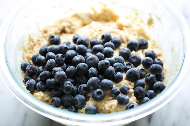 Blueberry Vanilla Muffins - These light and airy muffins are loaded with juicy blueberries and extra vanilla goodness!