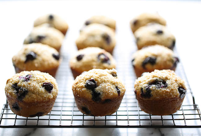 Blueberry Vanilla Muffins - These light and airy muffins are loaded with juicy blueberries and extra vanilla goodness!