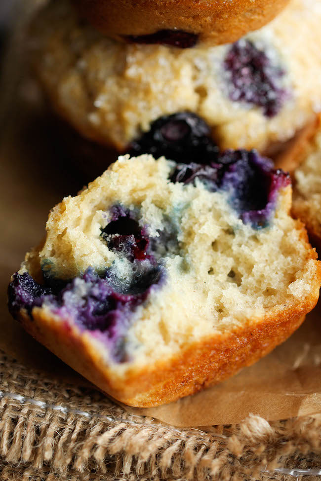 Blueberry Vanilla Muffins - These light and airy muffins are loaded with juicy blueberries and extra vanilla goodness!