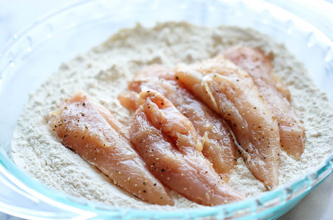 Asian Lemon Chicken Tenders - A wonderful asian twist to your favorite chicken tenders, tossed in the most heavenly sweet, lemon glaze!