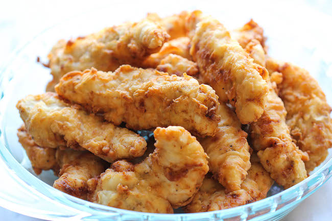 Asian Lemon Chicken Tenders - A wonderful asian twist to your favorite chicken tenders, tossed in the most heavenly sweet, lemon glaze!