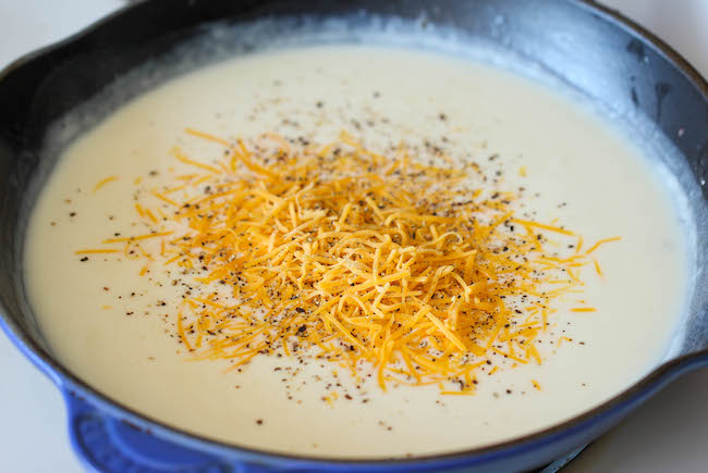 Broccoli Quinoa Casserole - Healthy, cheesy comfort food made with quinoa, broccoli, and a creamy sauce—topped with crunchy Panko for a guilt-free, satisfying meal.
