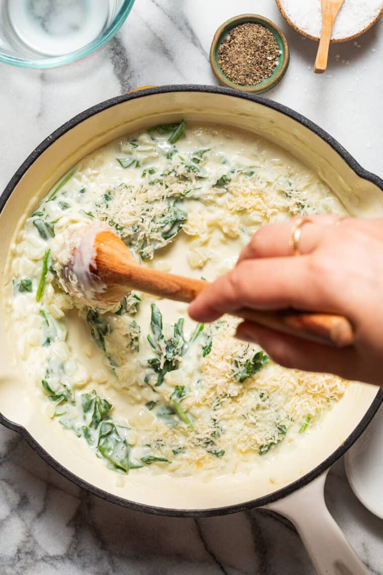 Parmesan and Spinach Orzo - This creamy, velvety orzo side dish is quick and easy + will go with any main dish! An absolute family-favorite.