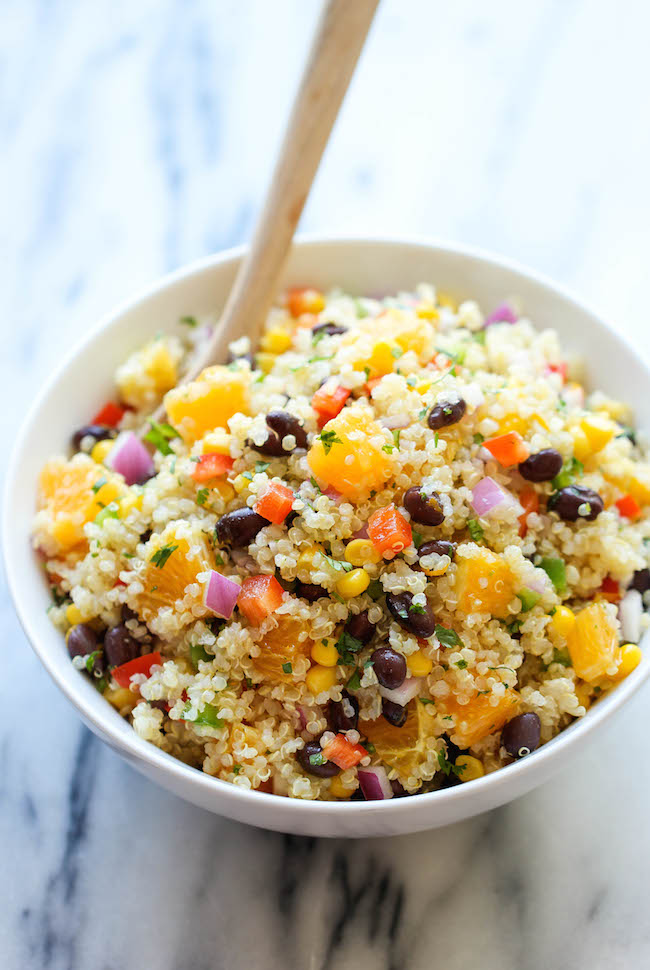 Black Bean Quinoa Salad - A light and healthy quinoa salad tossed in a refreshing orange vinaigrette, chockfull of protein and fiber!