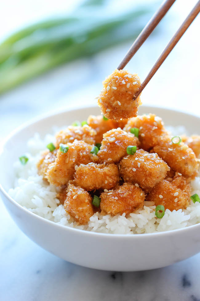 Baked Honey Garlic Chicken - A take-out favorite that you can make right at home, baked to crisp perfection. It's healthier, cheaper and so much tastier!