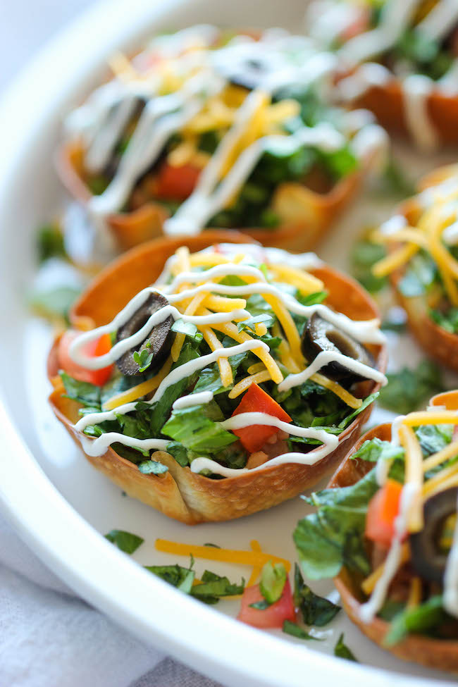 Mini Taco Salad Cups - These cute salad bowls are so fun to make, and even more fun to gobble up! Perfect as an appetizer or easy dinner!