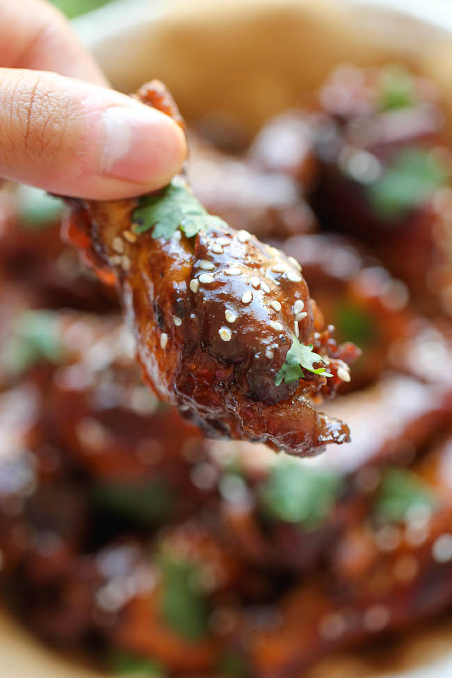 Slow Cooker Sticky Chicken Wings - The easiest wings you will ever make. Just throw everything into the crockpot and you're set! Easy peasy!