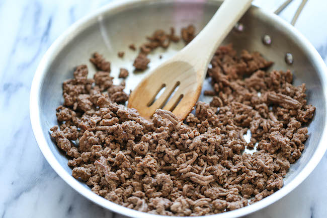 One Pan Enchilada Bake - The easiest and cheesiest enchilada bake made in a single pan - easy peasy with only one dirty pot. You can't beat that!