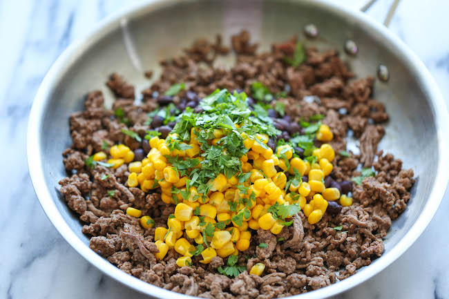 One Pan Enchilada Bake - The easiest and cheesiest enchilada bake made in a single pan - easy peasy with only one dirty pot. You can't beat that!