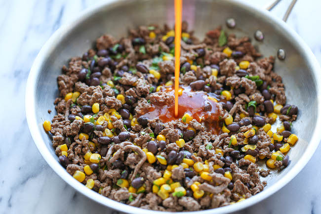 One Pan Enchilada Bake - The easiest and cheesiest enchilada bake made in a single pan - easy peasy with only one dirty pot. You can't beat that!