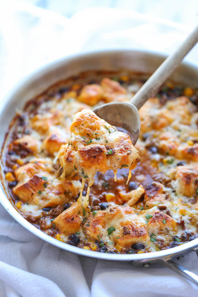 One Pan Enchilada Bake - The easiest and cheesiest enchilada bake made in a single pan - easy peasy with only one dirty pot. You can't beat that!