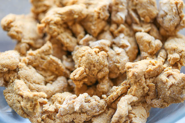 Homemade Peanut Butter Dog Treats - The easiest homemade dog treats ever - simply mix, roll and cut. Easy peasy, and so much healthier than store-bought!