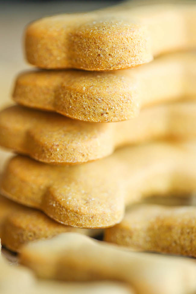 Homemade Peanut Butter Dog Treats - The easiest homemade dog treats ever - simply mix, roll and cut. Easy peasy, and so much healthier than store-bought!