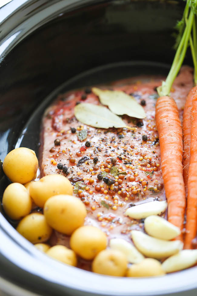 Slow Cooker Corned Beef - Let the crockpot do all the work for you - simply throw everything in and you are set. It's so easy, so tender and so flavorful!