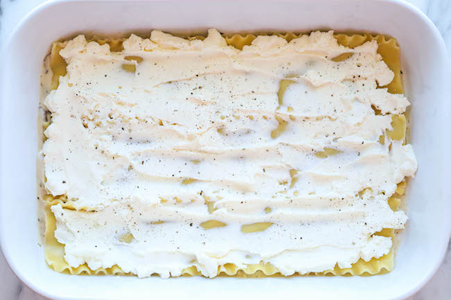 Creamy Spinach and Mushroom Lasagna - This is sure to become a family favorite. Best of all, it's freezer-friendly and can also be made ahead of time!