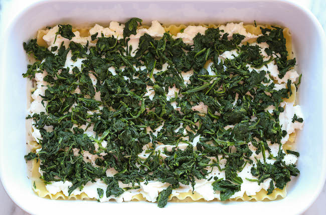 Creamy Spinach and Mushroom Lasagna - This is sure to become a family favorite. Best of all, it's freezer-friendly and can also be made ahead of time!