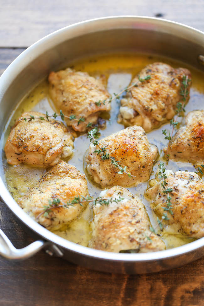 Parmesan Crusted Chicken - Crisp-tender chicken with the most amazing Parmesan crust and a lemony-herb sauce!