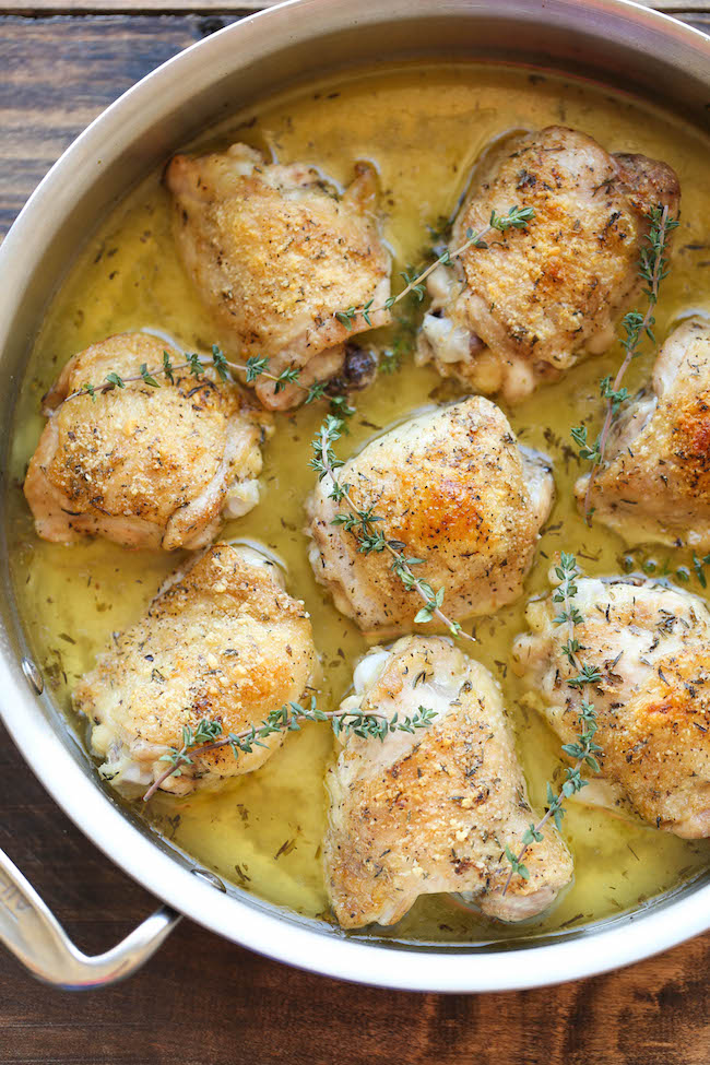 Parmesan Crusted Chicken - Crisp-tender chicken with the most amazing Parmesan crust and a lemony-herb sauce!