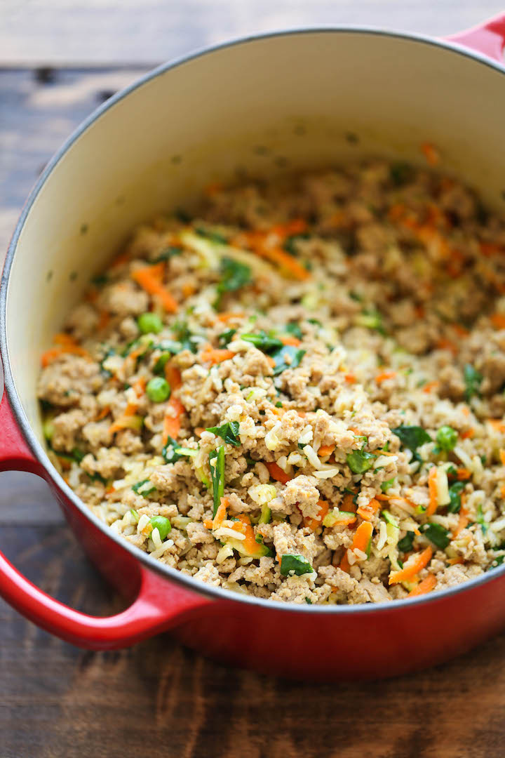 Healthy homemade dog food recipe portioned into bowls for serving
