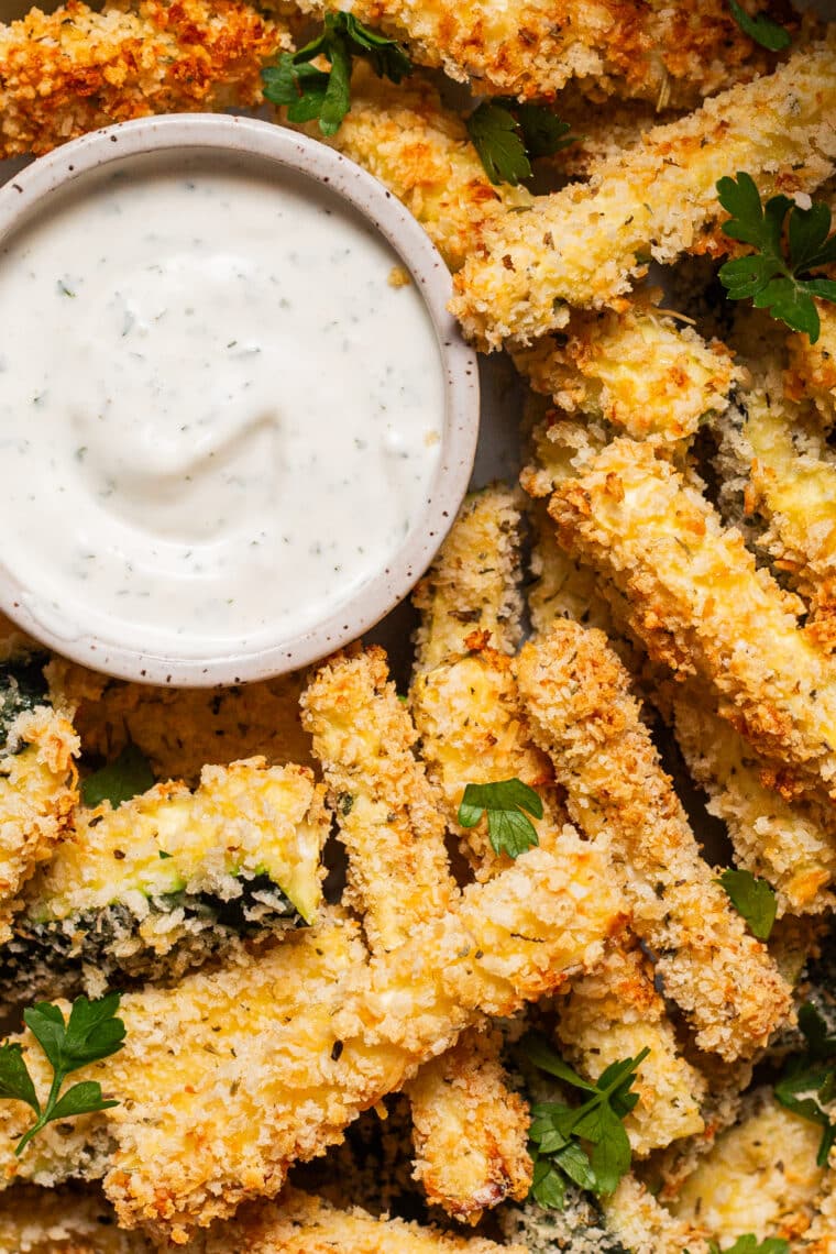 Baked Zucchini Fries - BAKED, super crispy, perfectly golden brown zucchini fries! So easy to make and such a healthier alternative to fries and chips. Yes, please!