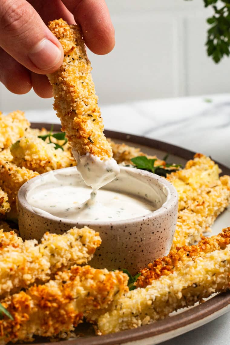 Baked Zucchini Fries - BAKED, super crispy, perfectly golden brown zucchini fries! So easy to make and such a healthier alternative to fries and chips. Yes, please!