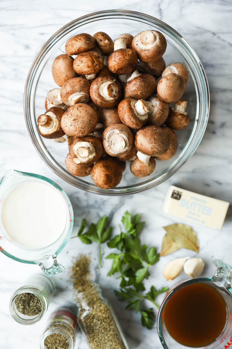 Slow Cooker Garlic Herb Mushrooms - The best and EASIEST way to make mushrooms. In a crockpot with garlic, herbs and butter! Just 5 min prep.