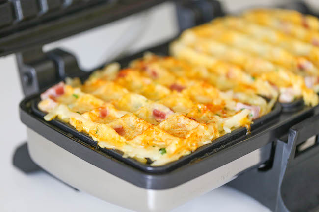 Ham and Cheese Hashbrown Waffles - Crunchy, yet silky smooth hashbrowns made right in the waffle iron. So quick, so easy, and just so darn good!