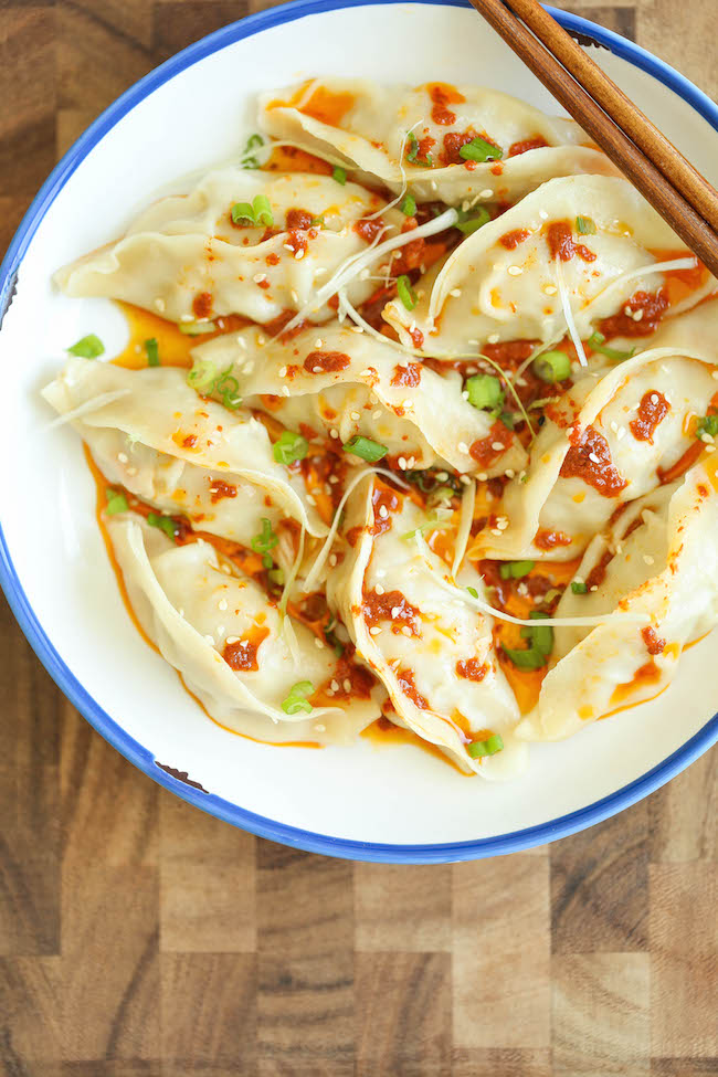 Spicy Chicken Potstickers - Make-ahead, freezer-friendly dumplings made completely from scratch with an optional hot chili oil sauce for a kick of heat!
