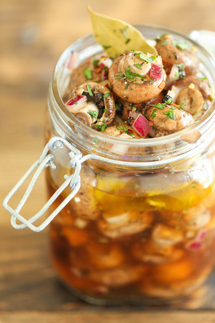 Easy Marinated Mushrooms - Quick, no-fuss with 10 min prep. You can even make these the night before! Perfect to feed a large crowd, and so irresistible!