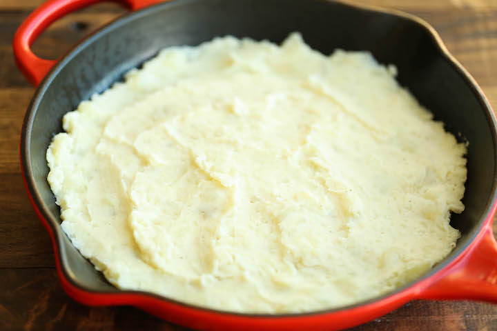 Broccoli and Potato Casserole - So hearty, comforting and cheesy! Makes for a perfect easy side dish or even a quick weeknight entree with added chicken!